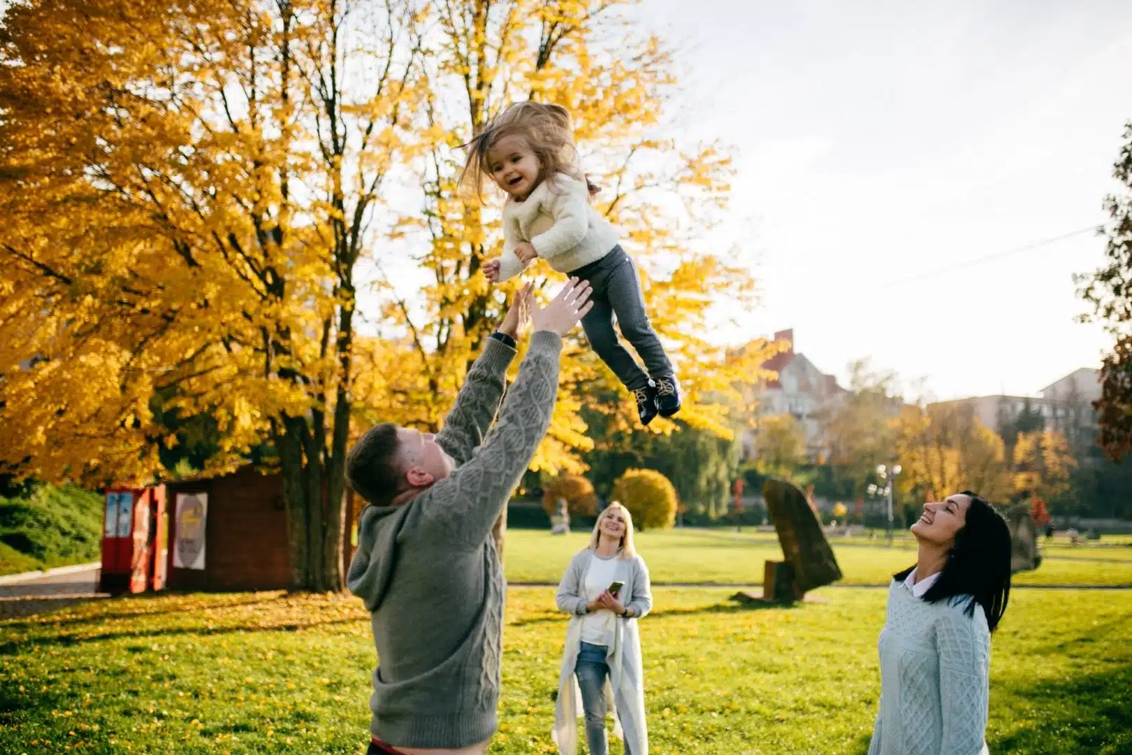 A father playing with her daughter